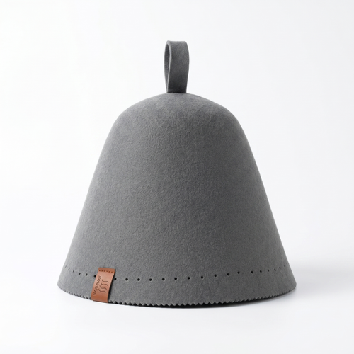 Grey merino wool sauna hat rendered on a soft light background, front three-quarter view